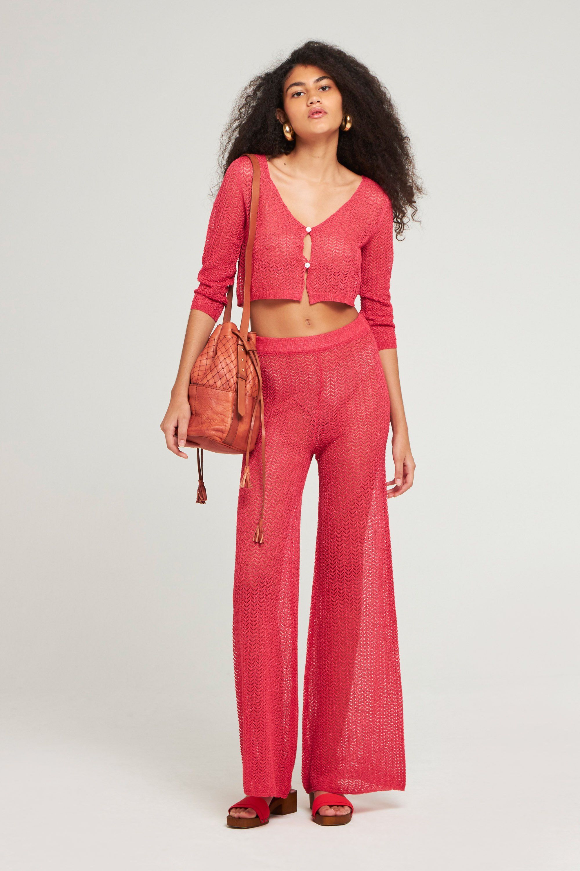 Open-knit flared trousers