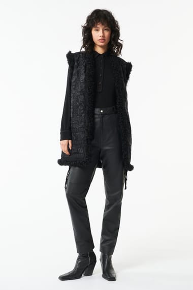 Black outlet fur vest
